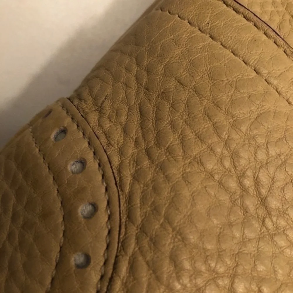 Coach cream pebbled leather perforated hobo bag